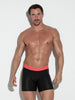 Muscular man wearing black and pink training shorts, showcasing athletic fit and comfort for activewear enthusiasts. Code 22 Training Compression Tights 9937 Code 22 Kleidung & Accessoires:Herren:Herrenmode:Fitnessmode:Lange Sporthosen nudosz.myshopify.com