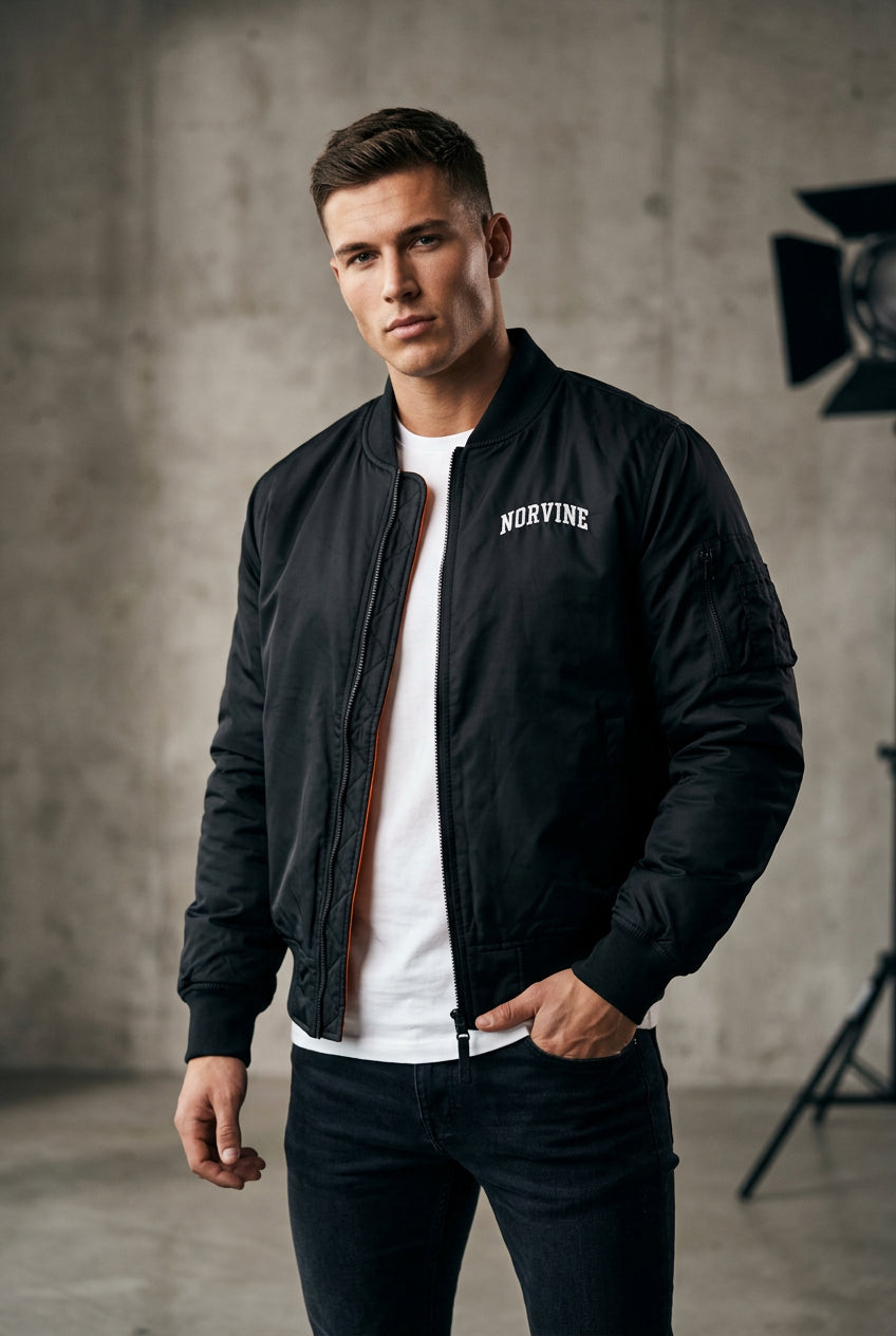 Norvine Steppjacke Herren schwarz mit orangem Futter